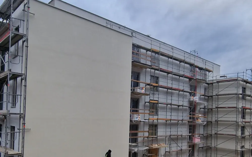 Apartment building with scaffolding during facade work